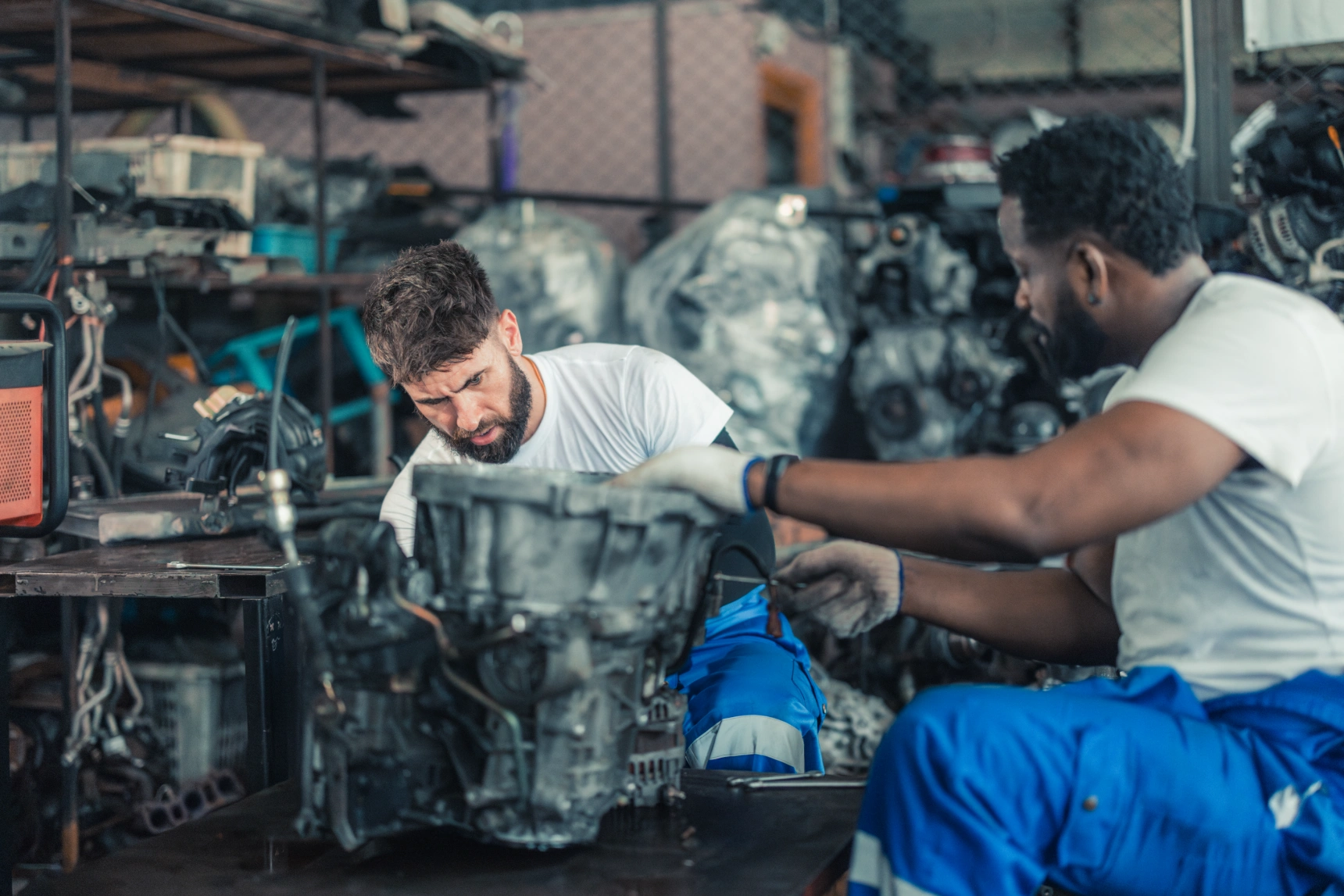 car-technician-check-engines-choose-quality-gear